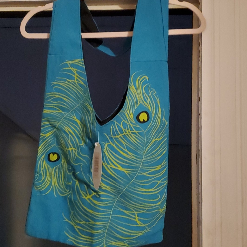 Canvas sling peacock shoulder bag.
